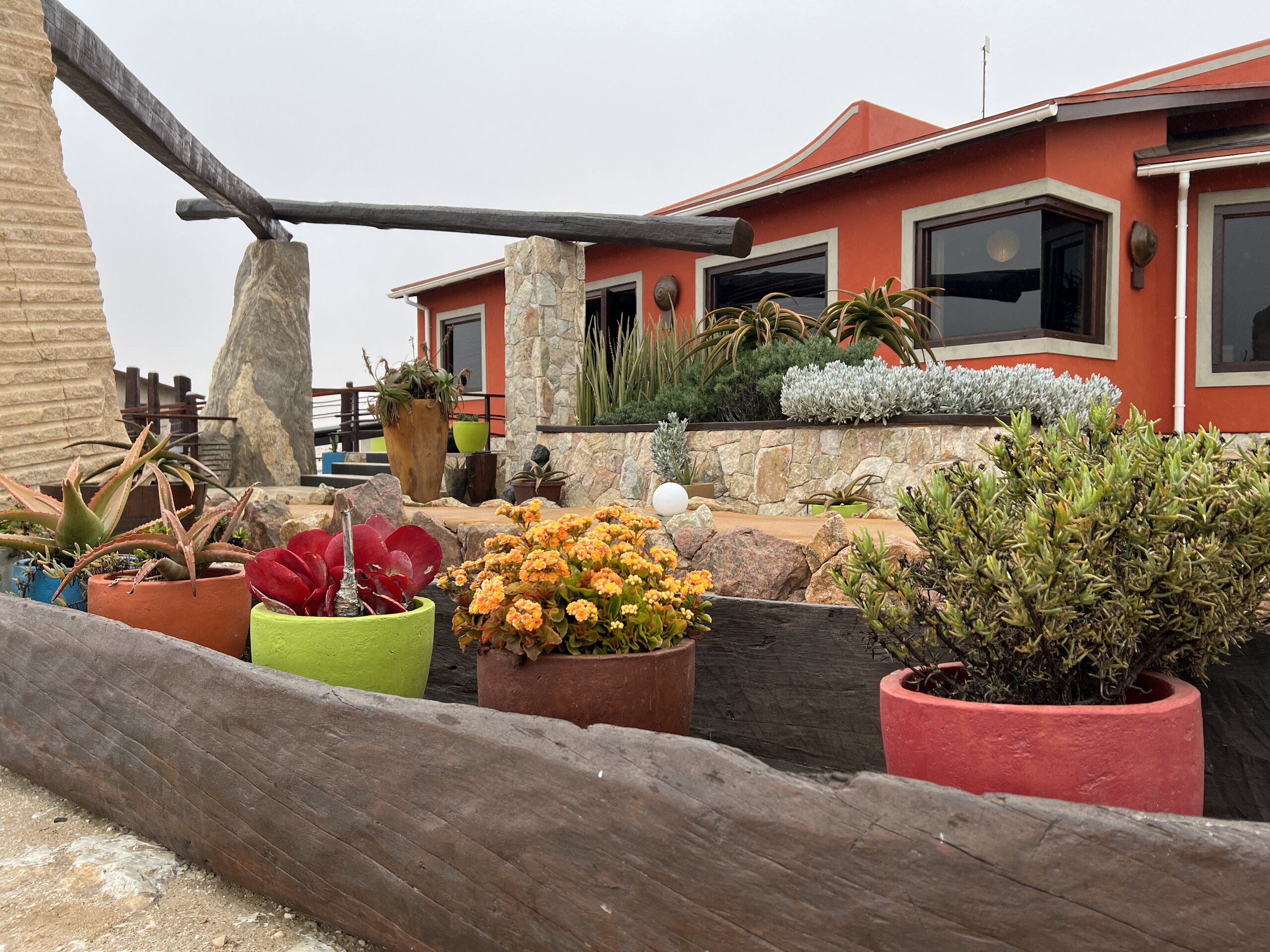 Desert Breeze lodge facade and courtyard garden