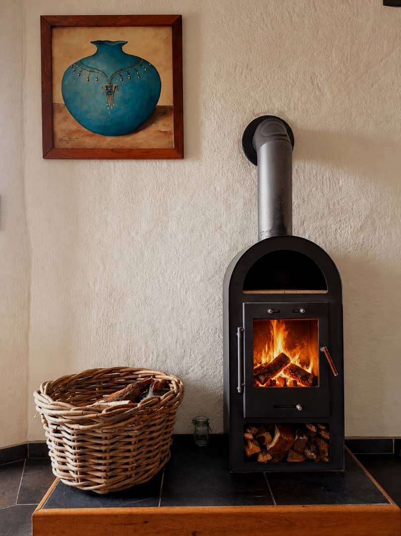 Wood-burning fireplace in the Desert Breeze breakfast room
