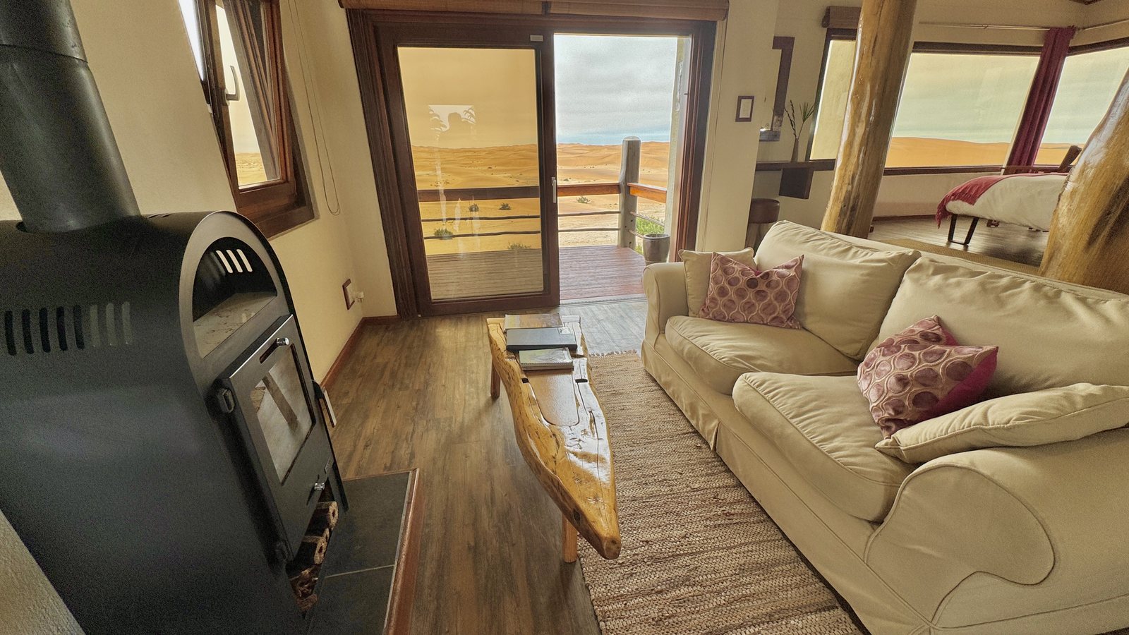 Desert Breeze bungalow lounge with fireplace and terrace