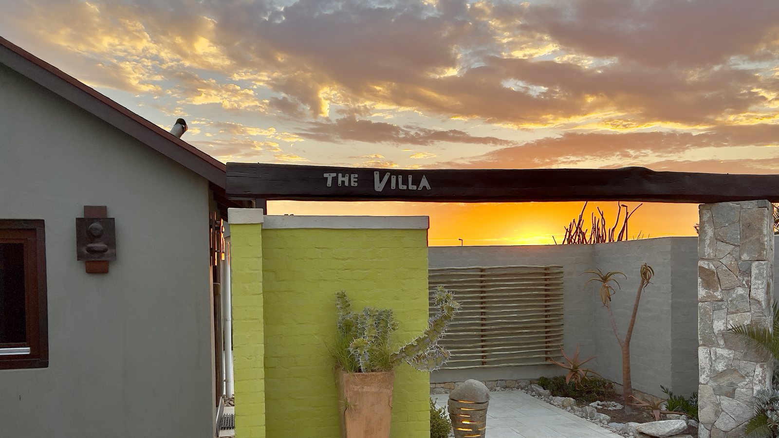 The Villa entrance at sunset